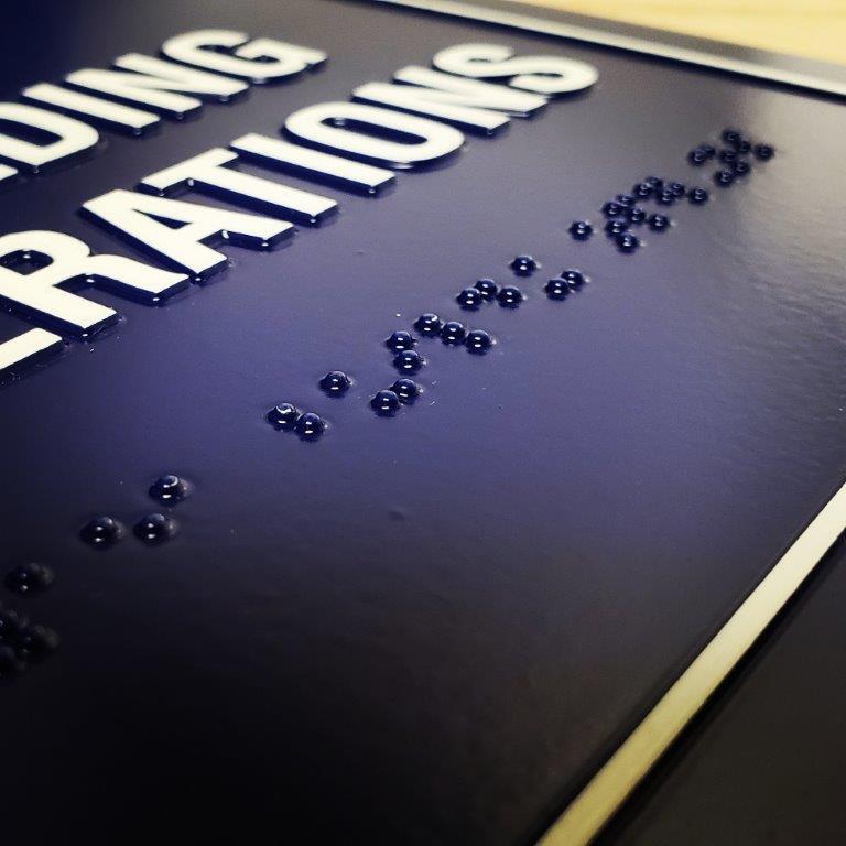 Braille on Sign