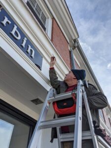 Sign Artist fine tunes a sign installation